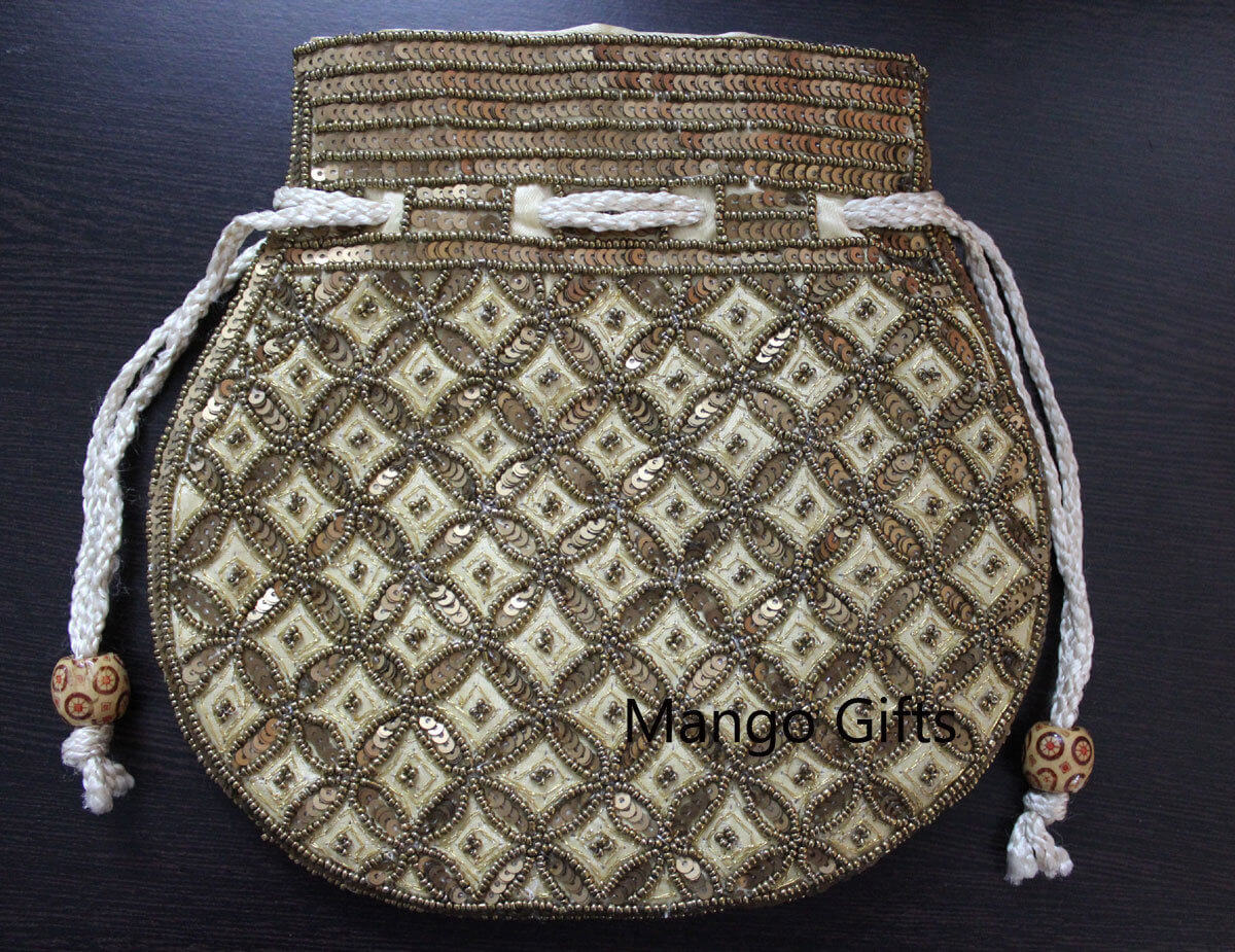 Beautiful olive golden handmade Indian potli bag with sequins, featuring intricate patterns and stylish strings.